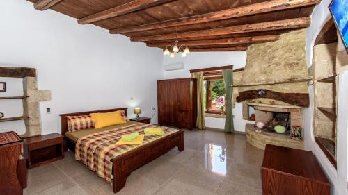 Ένα ή περισσότερα κρεβάτια σε δωμάτιο στο Villa Veryiana