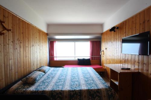 Krevet ili kreveti u jedinici u objektu Sole Alto Appartamenti Montana