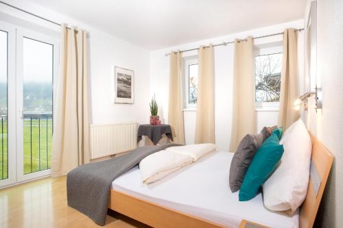 Postel nebo postele na pokoji v ubytování Zillertal Appartements