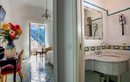 Koupelna v ubytování Hotel Reginella