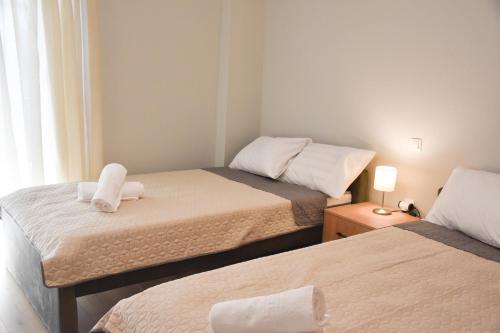 Posteľ alebo postele v izbe v ubytovaní Comfy Central Apartment