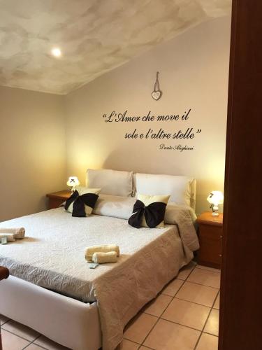 A bed or beds in a room at La Candida Rosa L T Anagni