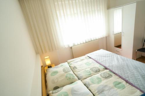 Postel nebo postele na pokoji v ubytování Apartment-76