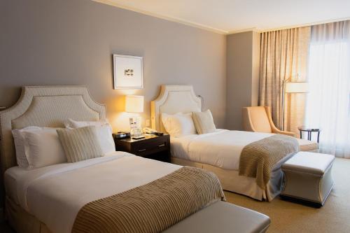 Una cama o camas en una habitación de Bristol Panama, a Registry Collection Hotel