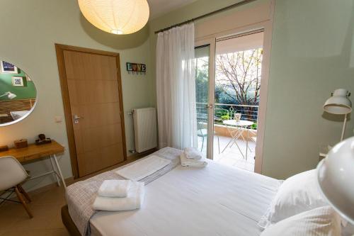 Katil atau katil-katil dalam bilik di Gallery Suites Parga