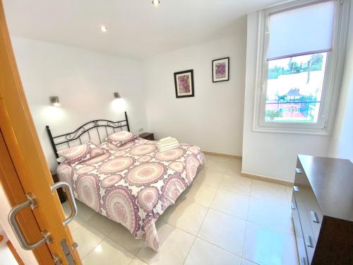 Postel nebo postele na pokoji v ubytování Bungalow El Cortijo