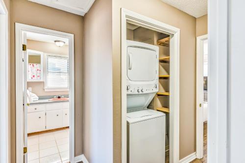 a laundry room with a washer and dryer at Heron's Nest in Perdido Key