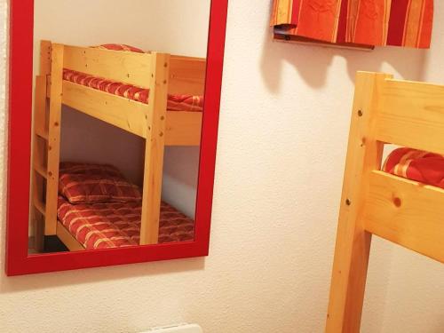a mirror on a wall with a bunk bed at Appartement Saint-François-Longchamp, 2 pièces, 4 personnes - FR-1-635-10 in Saint-François-Longchamp