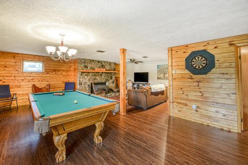 a living room with a pool table in it at Gleanings Pond in McHenry