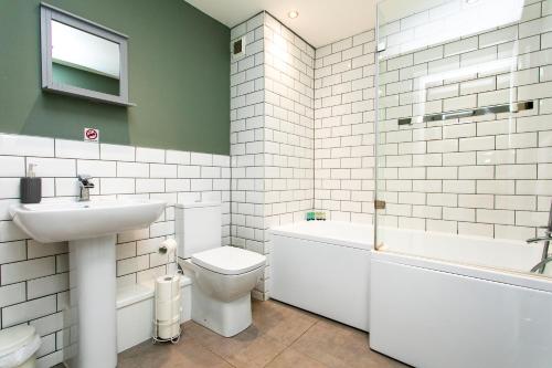 A bathroom at Portland Apartments 198 by #ShortStaysAway