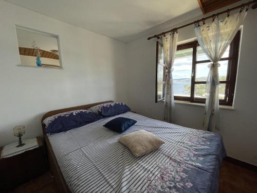 Postel nebo postele na pokoji v ubytování Seafront house Šolta