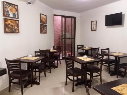 Reštaurácia alebo iné gastronomické zariadenie v ubytovaní Hotel Vila Real