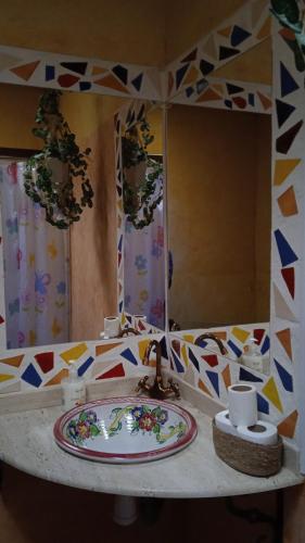 a bathroom counter with a sink and a mirror at El Quinto Pino Riópar in Riópar