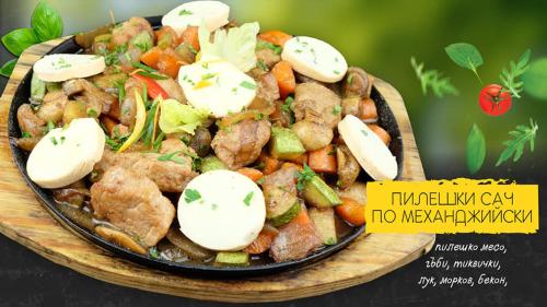 a plate of food with vegetables and eggs on it at Family Hotel Kedara in Burgas City