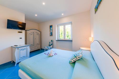 Posteľ alebo postele v izbe v ubytovaní B&B il vetraio