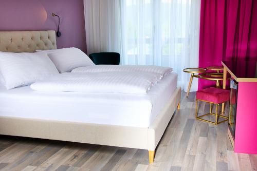 Hotel Eden Parkにあるベッド