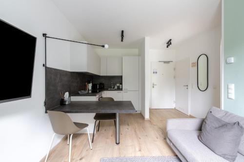 Una cocina o cocineta en Limehome Linz Hopfengasse