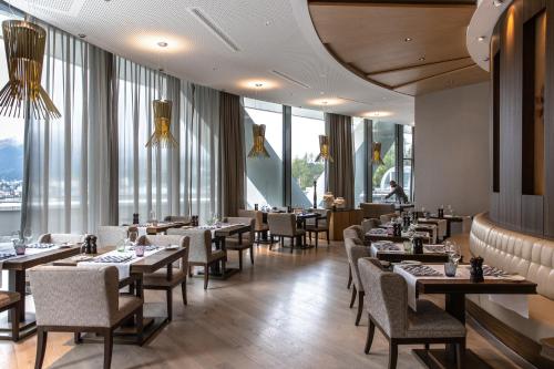 Ресторант или друго място за хранене в AlpenGold Hotel Davos