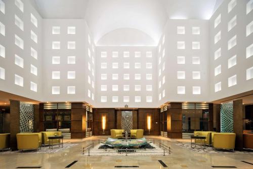 a rendering of the lobby of a hotel at Radisson Blu Hotel, Riyadh in Riyadh