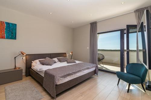 Postel nebo postele na pokoji v ubytování Villa Eleonora, luxury villa in Višnjan, Žužići, near Poreč