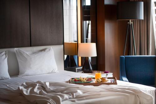 Letto o letti in una camera di Holiday Inn Kayseri - Duvenonu by IHG