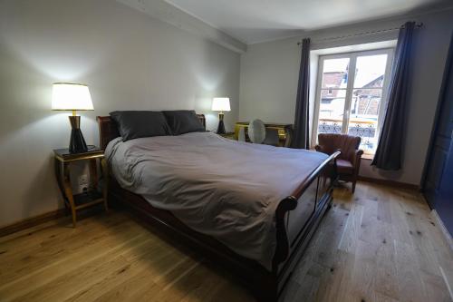 Posteľ alebo postele v izbe v ubytovaní La Bayenne