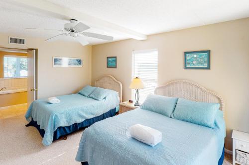 Una cama o camas en una habitación de Sand Pebbles #AV204