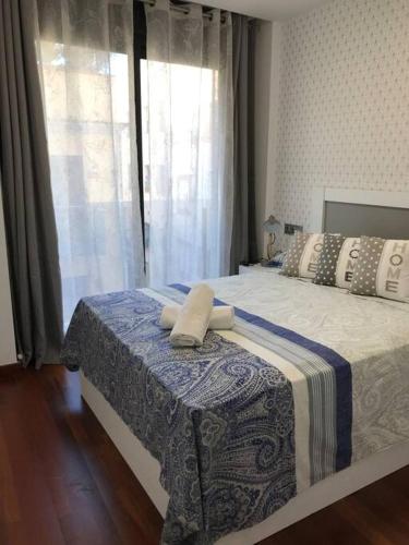Postel nebo postele na pokoji v ubytování Lujoso apartamento enfrente del mar