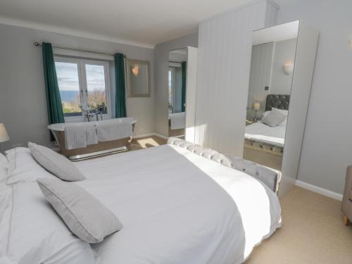 Voodi või voodid majutusasutuse Voebroch toas