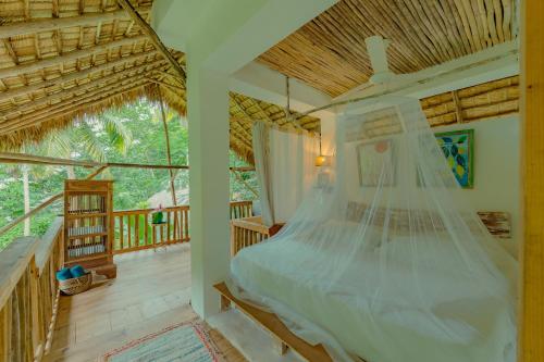 a bedroom with a bed in a house at El Valle Lodge in El Valle