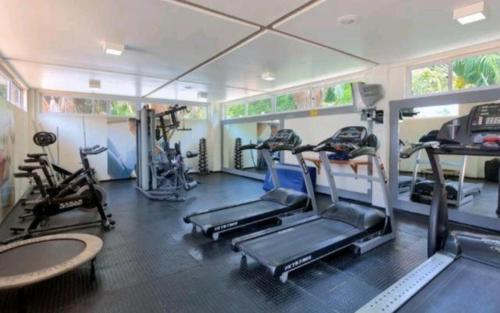 a gym with several treadmills and exercise bikes at Barreirinhas Gran Lençóis Flat Residence Mandacaru 506 Particular in Barreirinhas