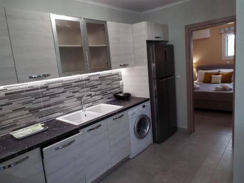 Dapur atau dapur kecil di Strelitzia Apartments