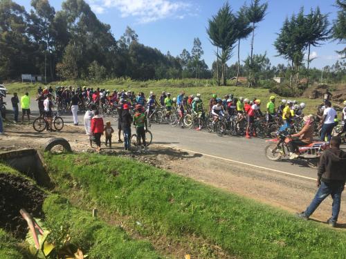 a large group of people on bikes on a road at Bubbles Lodge Kinangop in South Kinangop