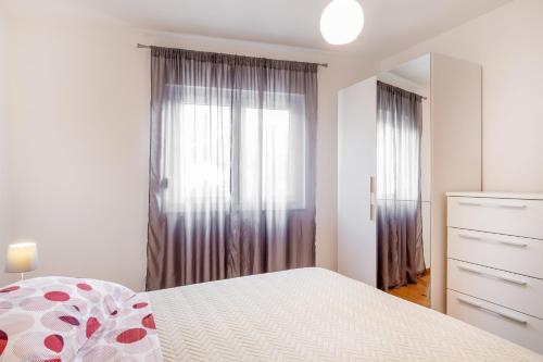 Katil atau katil-katil dalam bilik di SOLU Apartment