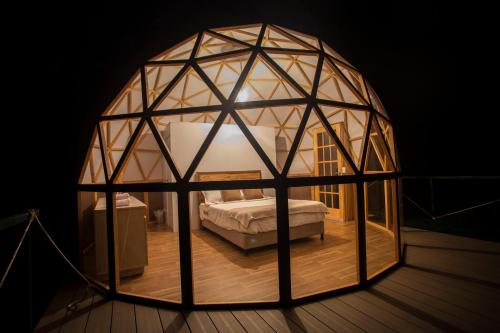Una cama o camas en una habitación de Reserva del Dorado