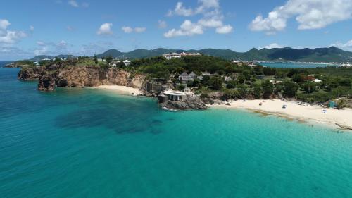 an aerial view of a small island in the ocean at St Martin Nettlé Bay Lovely appartment in Baie Nettle