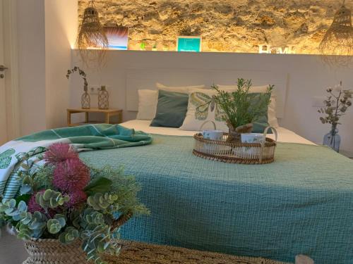 Een bed of bedden in een kamer bij Pitusa Home