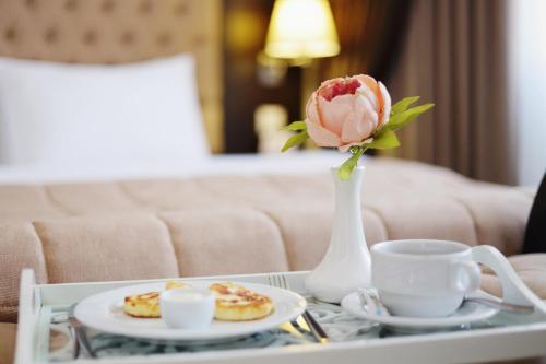 Giường trong phòng chung tại Hotel Home Parq