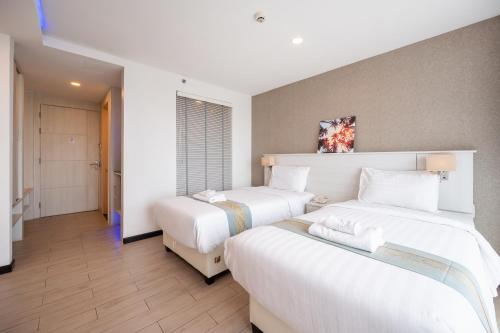 Ένα ή περισσότερα κρεβάτια σε δωμάτιο στο Sonia residence - SHA Extra Plus