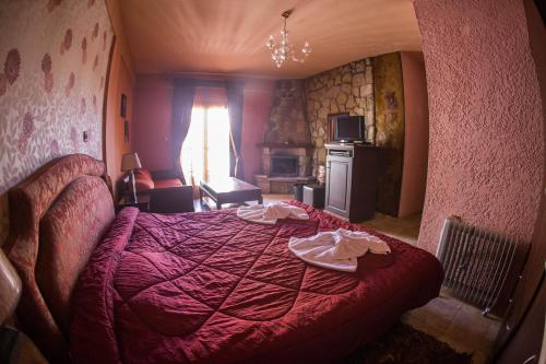 Postel nebo postele na pokoji v ubytování Silva Suites