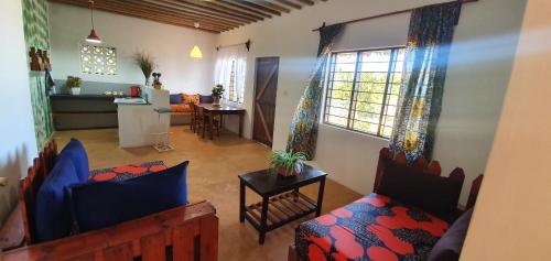 A seating area at Matemwe Ocean View Villas