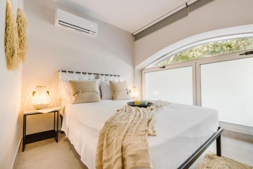 Postel nebo postele na pokoji v ubytování Manolis Loft Apartment, Rhodes Town