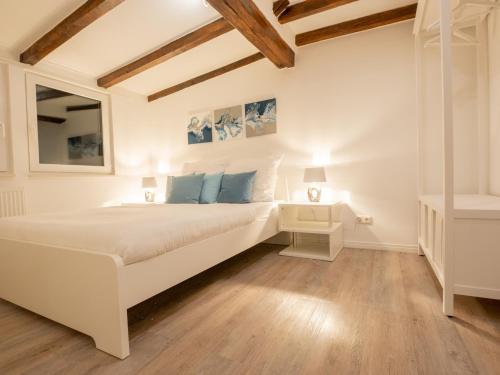 Ένα ή περισσότερα κρεβάτια σε δωμάτιο στο EUPHORAS - Stylisches Apartment in Hannover