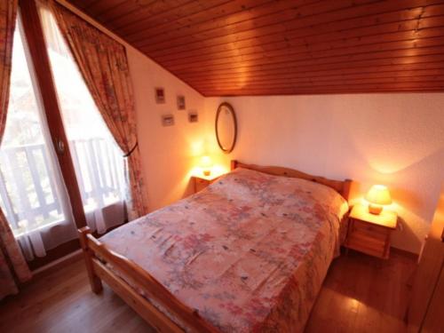 Appartement Les Saisies, 3 pièces, 8 personnes - FR-1-293-82にあるベッド