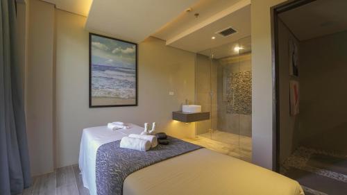 Postel nebo postele na pokoji v ubytování Belmont Hotel Boracay