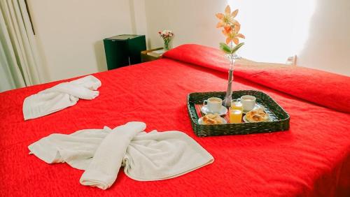 Ένα ή περισσότερα κρεβάτια σε δωμάτιο στο Crystal Hotel