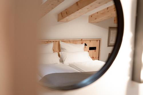 Hotel & Appartements Tiroler Buamにあるベッド