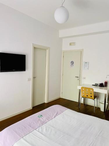 TV a/nebo společenská místnost v ubytování Via Padova 165