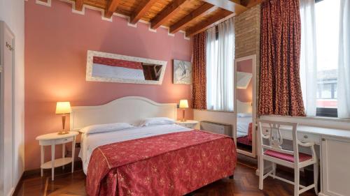 Katil atau katil-katil dalam bilik di Primotel Brescia
