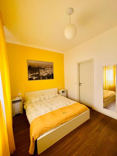 Postel nebo postele na pokoji v ubytování Via Padova 165